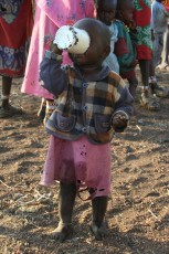 Young Boy In Masai Mara Village in Kenya
